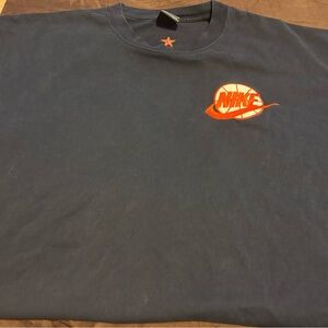 Nike Dark T-Shirt with Vibrant Orange Emblem